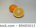 Amanatsu cut in half on a white background 89483013