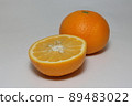 Amanatsu cut in half on a white background 89483022