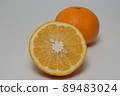 Amanatsu cut in half on a white background 89483024