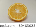 Amanatsu cut in half on a white background 89483028