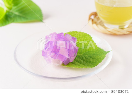 Seasonal Japanese sweets "hydrangea" and cold tea Seasonal Japanese sweets "hydrangea" and cold tea 89483071