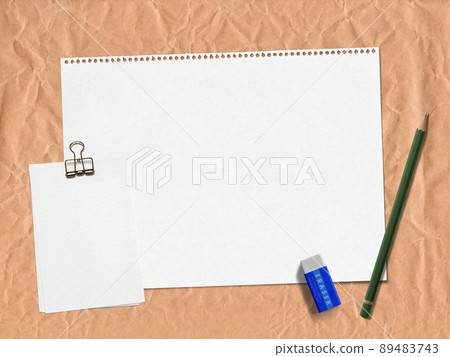With kraft paper background and sketchbook, note paper and pencil and eraser 89483743