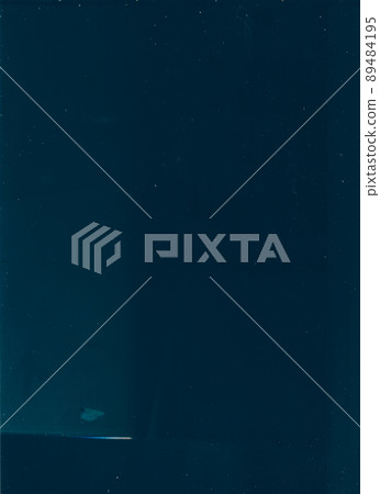 Distressed overlay. Stained glass. Old screen effect. Dust scratches defect weathered texture dark blue transparent abstract background. 89484195