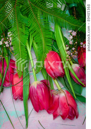 flowers on wooden background . Spring summer border template floral background. Light air delicate 89485368