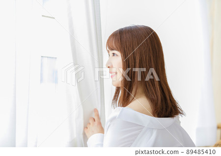 Female portrait white shirt shoulder 89485410