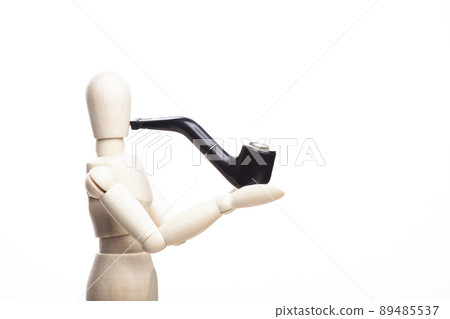 image of wooden figure smoking pipe white background image of wooden figure smoking pipe white background 89485537