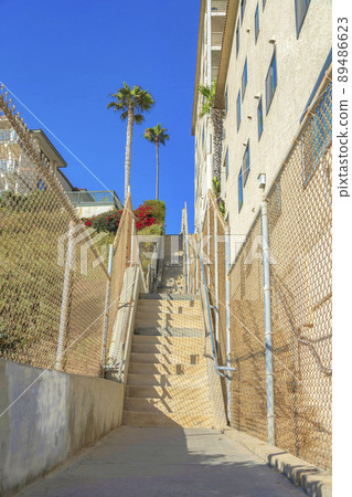 Concrete pathway heading to the stairs at San Clemente, California 89486623
