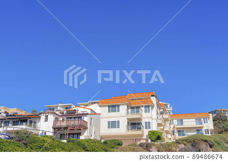 Low angle view of a neighborhood with big houses at San Clemente, California 89486674
