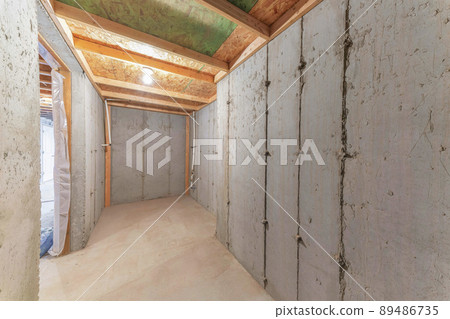 Unfinished cold storage room interior at the basement 89486735