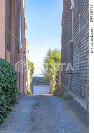 Alley way in the middle of residential buildings at San Francisco, California Alley way in the middle of residential buildings at San Francisco, California 89486752