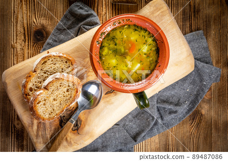 Polish barley soup with vegetables and chicken. Polish barley soup with vegetables and chicken. 89487086