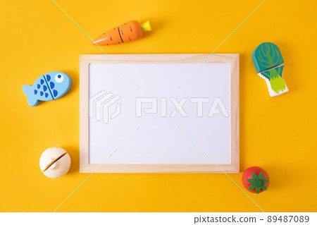 Chalkboard writing board with wooden kid toy for decoration design. Copy space background, child education  89487089