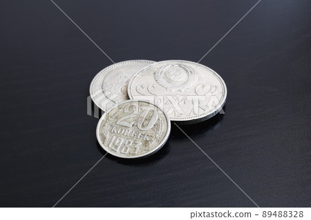Two old USSR coins on a black background Two old USSR coins on a black background 89488328
