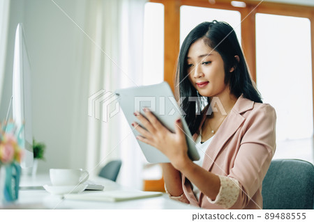 data analysis, plan, marketing, accounting, audit, Portrait of asian business woman planning marketing using tablet and computer to present marketing plan project at meeting data analysis, plan, marketing, accounting, audit, Portrait of asian business woman planning marketing using tablet and computer to present marketing plan project at meeting 89488555