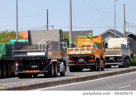 Image of a running dump truck 89489874