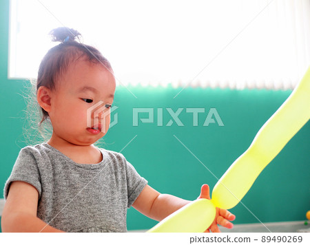 2-year-old child indoor play 89490269