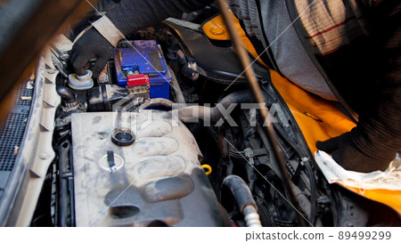 Car repair service. The insides of the car under the hood 89499299