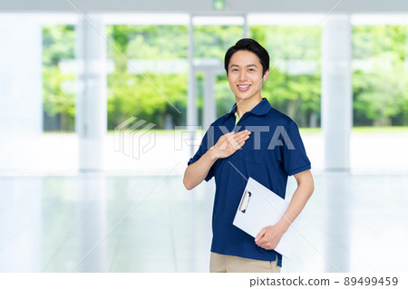 Middle-aged man of care staff Middle-aged man of care staff 89499459
