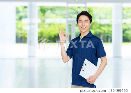 Middle-aged man of care staff Middle-aged man of care staff 89499463
