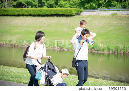 Family of four returning from the park 89501550