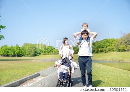 Family of four returning from the park 89501551