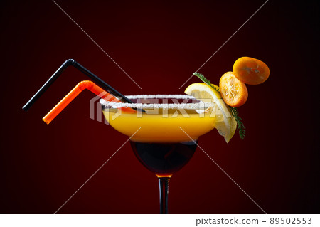 Cocktail with kumquat and lemon 89502553