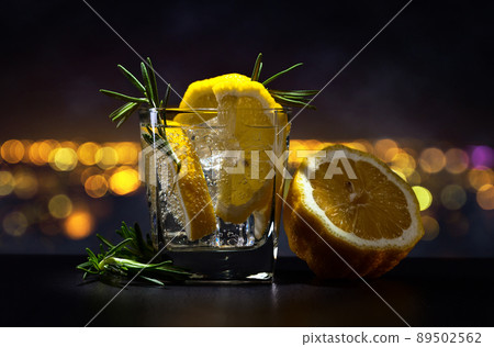 gin with tonic on a background of night city gin with tonic on a background of night city 89502562