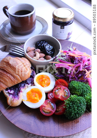 Lunch plate of colorful vegetables and croissants Lunch plate of colorful vegetables and croissants 89503188