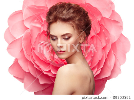 Beautiful woman on the background of a large flower Beautiful woman on the background of a large flower 89503591