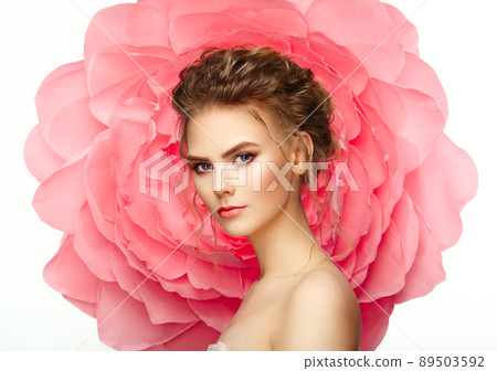 Beautiful woman on the background of a large flower Beautiful woman on the background of a large flower 89503592