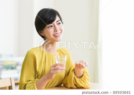 Women taking medicine Supplements Health Women taking medicine Supplements Health 89503691