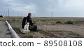 Motorbike driver enjoys nature view 89508108