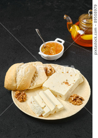 Homemade curd cheese with raisin and walnut Homemade curd cheese with raisin and walnut 89508979