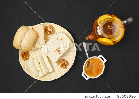 Top view of homemade curd cheese with raisin and walnut Top view of homemade curd cheese with raisin and walnut 89508980