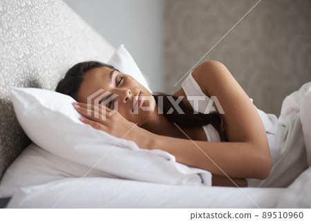 Sweet dreams in process. A beautiful young woman sleeping in her bed. Sweet dreams in process. A beautiful young woman sleeping in her bed. 89510960