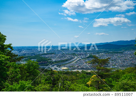 Settsu cityscape, Meishin Expressway and Mt. Rokko in Osaka Prefecture Settsu cityscape, Meishin Expressway and Mt. Rokko in Osaka Prefecture 89511007