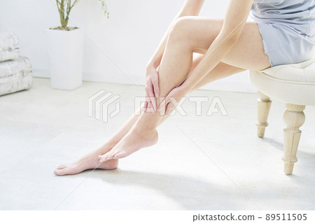 Female foot care living room without face Female foot care living room without face 89511505