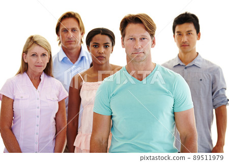 Taking a stand for unity. Five adults of varying ages and ethnicities standing in a group with serious expressions. Taking a stand for unity. Five adults of varying ages and ethnicities standing in a group with serious expressions. 89511979