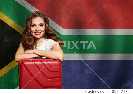 Travel, work, education and volunteering in South Africa concept. Happy woman with red suitcase  89512124