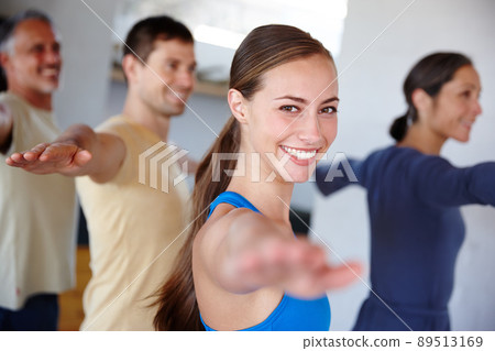 Inspired to be healthy in mind and body. A cropped portrait of a happy family doing yoga otgether. 89513169