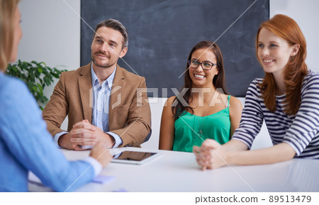 The corporate world. Cropped shot of corporate businesspeople in the office. The corporate world. Cropped shot of corporate businesspeople in the office. 89513479