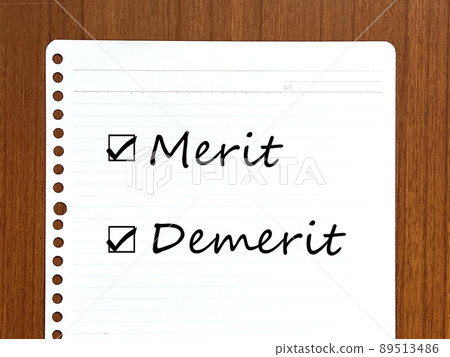 Merit and Demerit lettering ring notes _ wood grain background 89513486