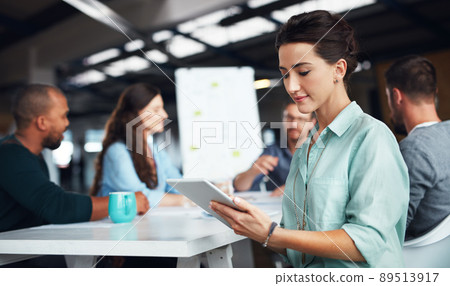 The creative process. Shot of businesspeople having a meeting in a modern office. The creative process. Shot of businesspeople having a meeting in a modern office. 89513917