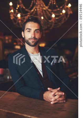 Waiting for my drink.... Cropped portrait of a young man sitting in a bar. 89514446