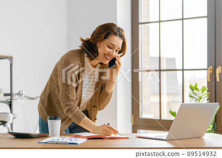 woman working in office woman working in office 89514932