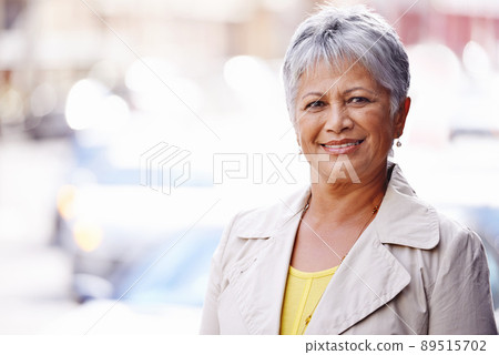 Out and about in the city. Portrait of a mature woman spending a day in the city. Out and about in the city. Portrait of a mature woman spending a day in the city. 89515702