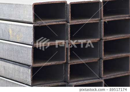 Metal profile pipe of rectangular cross section in packs at the warehouse of metal products 89517174