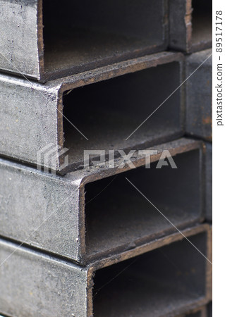 Metal profile pipe of rectangular cross section in packs at the warehouse of metal products 89517178