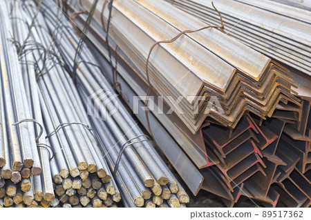 Metal profiles of different kinds are located in the metal products warehouse 89517362