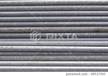Metal profiles of different kinds are located in the metal products warehouse Metal profiles of different kinds are located in the metal products warehouse 89517393